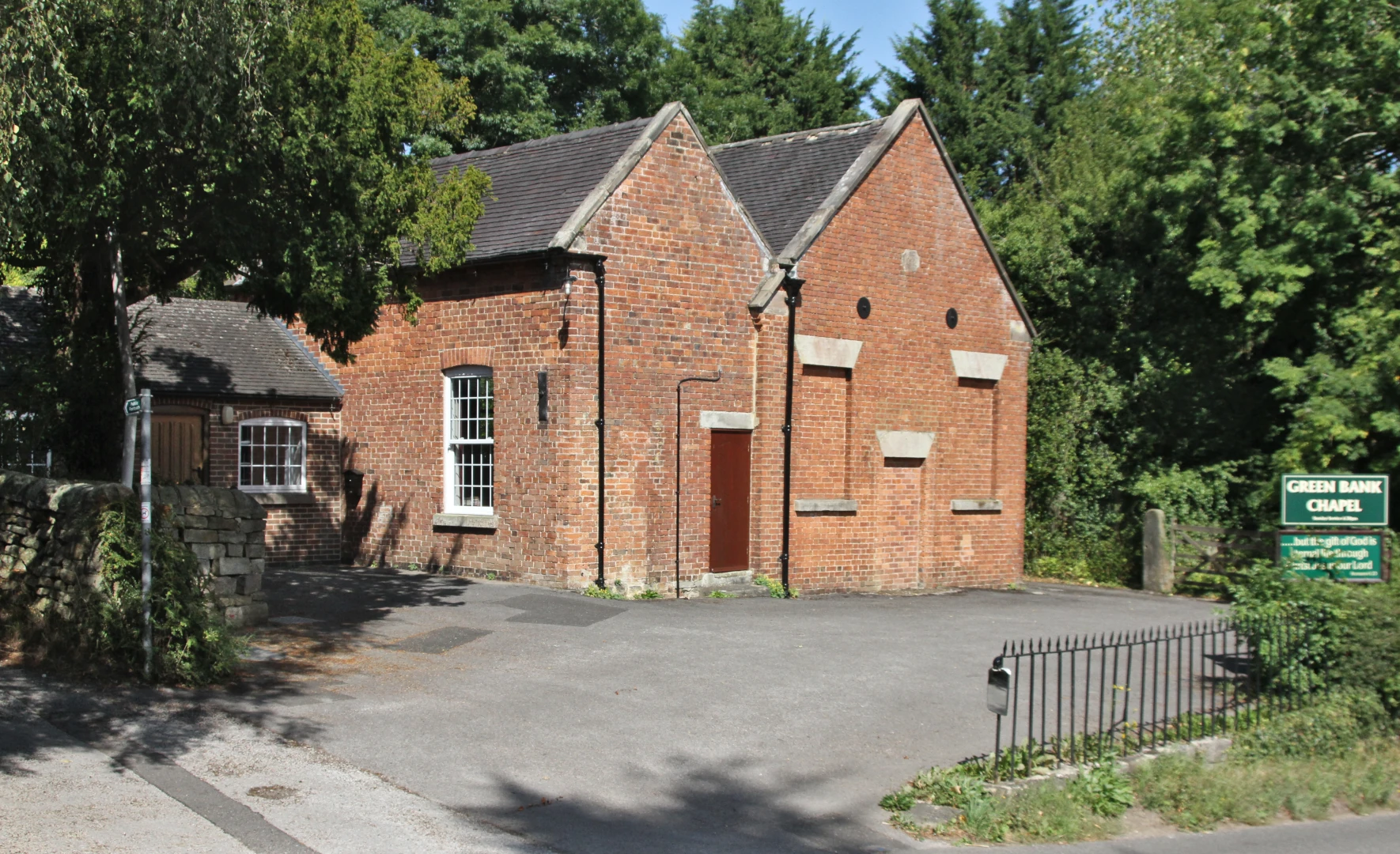 Outside view of Green Bank Chapel building and car park from the road